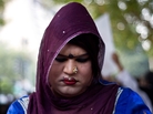 An Indian gay rights activist looks down during an anti-Section 377 protest in New Delhi on December 11, 2013. An Indian gay rights activist looks down during an anti-Section 377 protest in New Delhi on December 11, 2013.