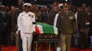 Nelson Mandela's casket was escorted to the funeral service by senior members of South Africa's military.