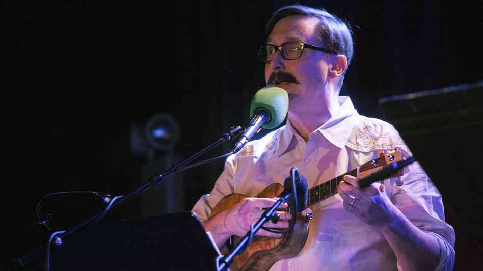 Comedian John Hodgman helped lead a game, then picked up the ukulele for a rendition of "Auld Lang Syne." Comedian John Hodgman helped lead a game, then picked up the ukulele for a rendition of "Auld Lang Syne."