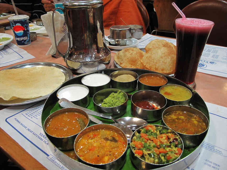 Date for two: Dinner includes a South Indian thali platter that typically includes dal, vegetables, roti, rice, curd (yogurt) and chutney served in small bowls, or katori, on a round tray. Throw in an order of delicious samosas. Date for two: Dinner includes a South Indian thali platter that typically includes dal, vegetables, roti, rice, curd (yogurt) and chutney served in small bowls, or katori, on a round tray. Throw in an order of delicious samosas.