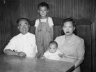William Wong (standing) poses with his parents and nephew in an old family photo. Wong's mother immigrated to the U.S. from China as his father's "sister" to bypass the Chinese Exclusion Act of 1882. William Wong (standing) poses with his parents and nephew in an old family photo. Wong's mother immigrated to the U.S. from China as his father's "sister" to bypass the Chinese Exclusion Act of 1882.