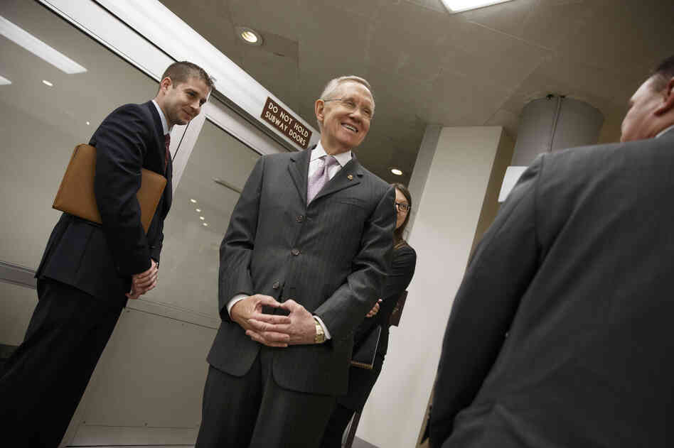 Majority Leader Harry Reid, D-Nev., takes a break from the Senate floor Tuesday after a bipartisan budget compromise cleared a procedural hurdle. Majority Leader Harry Reid, D-Nev., takes a break from the Senate floor Tuesday after a bipartisan budget compromise cleared a procedural hurdle.
