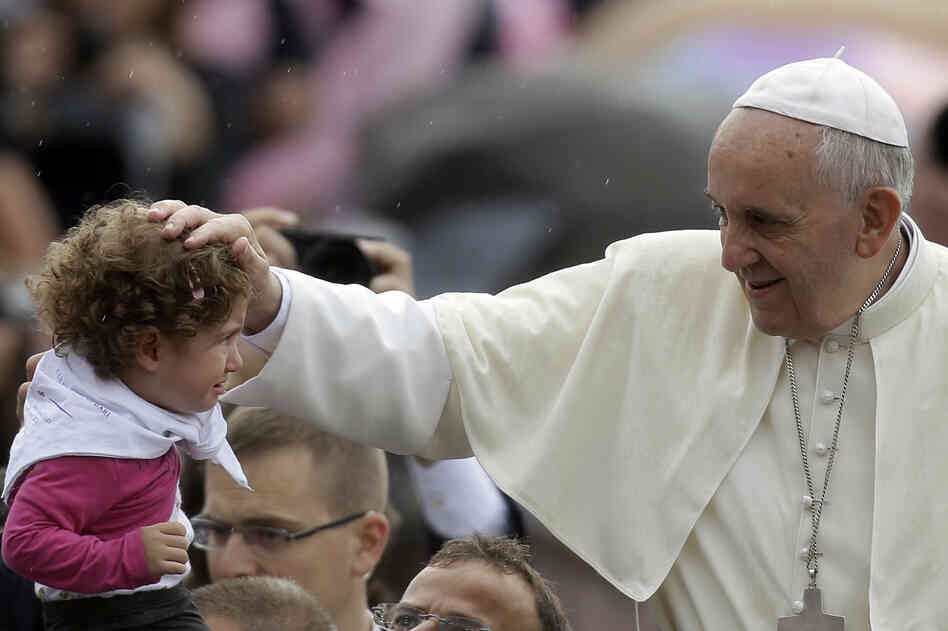 Pope Francis blesses a child during the weekly general audience in St. Peter's Square at the Vatican in October. Pope Francis blesses a child during the weekly general audience in St. Peter's Square at the Vatican in October.