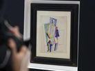 Picasso's 1914 cubist drawing "L'homme au Gibus," or "Man in the Opera Hat," is presented at Sotheby's auction house in Paris. Picasso's 1914 cubist drawing "L'homme au Gibus," or "Man in the Opera Hat," is presented at Sotheby's auction house in Paris.