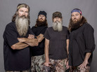 Four of the stars of Duck Dynasty, from left to right: Phil Robertson, Jase Robertson (Phil's son), Si Robertson (Phil's brother) and Willie Robertson (Phil's son). Four of the stars of Duck Dynasty, from left to right: Phil Robertson, Jase Robertson (Phil's son), Si Robertson (Phil's brother) and Willie Robertson (Phil's son).