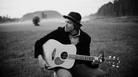 In his music, Josh Garrels says, he tries to "peel back layers" of what it means to be a Christian. In his music, Josh Garrels says, he tries to "peel back layers" of what it means to be a Christian.