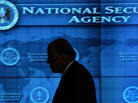 Then-Director of National Intelligence John Negroponte walks the hallways of the Threat Operations Center inside the National Security Agency in 2006. Then-Director of National Intelligence John Negroponte walks the hallways of the Threat Operations Center inside the National Security Agency in 2006.