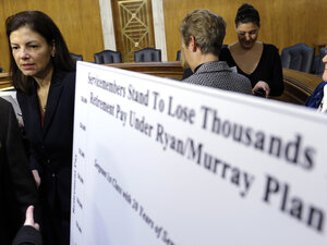 Sen. Kelly Ayotte, R-N.H., left, is urging her Senate colleagues to change the budget proposal that cuts retirement benefits for current and future military retirees.