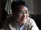 Qiu Xiaolong in his ancestral house during a visit from his home in St. Louis. Qiu Xiaolong in his ancestral house during a visit from his home in St. Louis.