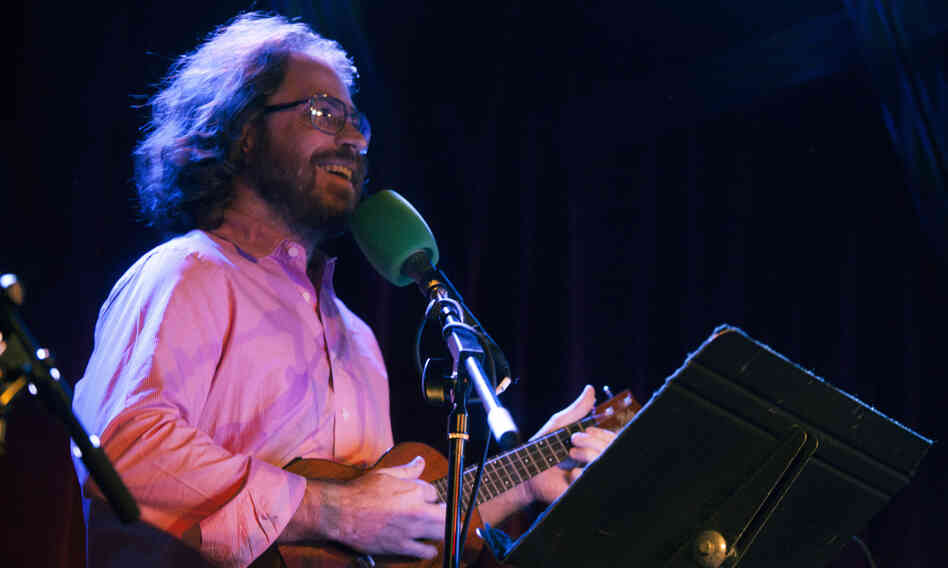 Jonathan Coulton performs live from the Ask Me Another stage at The Bell House in Brooklyn, NY. Jonathan Coulton performs live from the Ask Me Another stage at The Bell House in Brooklyn, NY.