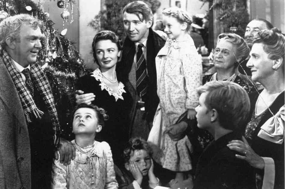 Worth living for: George Bailey, center, played by James Stewart, is reunited with his wife, Mary, played by Donna Reed, and his children in the final scene of Frank Capra's 1946 classic, It's A Wonderful Life. Worth living for: George Bailey, center, played by James Stewart, is reunited with his wife, Mary, played by Donna Reed, and his children in the final scene of Frank Capra's 1946 classic, It's A Wonderful Life.