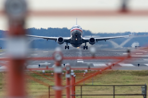 A Boeing 737 takes off from Ronald Reagan Washington National Airport in Arlington, Va. Demand remains high for 737s and 777s, helping the company weather problems with its 787 earlier this year. (Image credit: AFP/Getty Images)