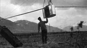 Lawrence with the 49-pound "Captive Airship."