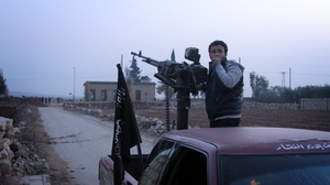 A man holds his rifle during clashes between the Free Syrian Army and ISIS in Aleppo, Syria, on Jan. 4. The fighting between the rebels and ISIS militants is taking place in Aleppo and Raqqa.