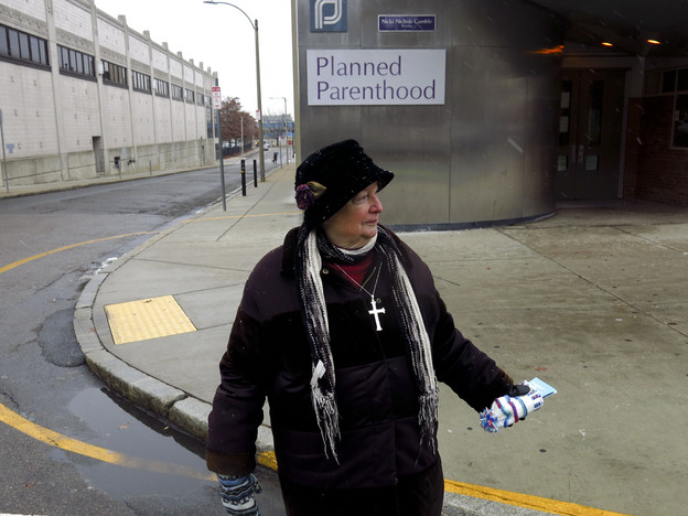 Eleanor McCullen, lead plaintiff in the case before the Supreme Court, outside the Planned Parenthood clinic in Boston. (Image credit: NPR)
