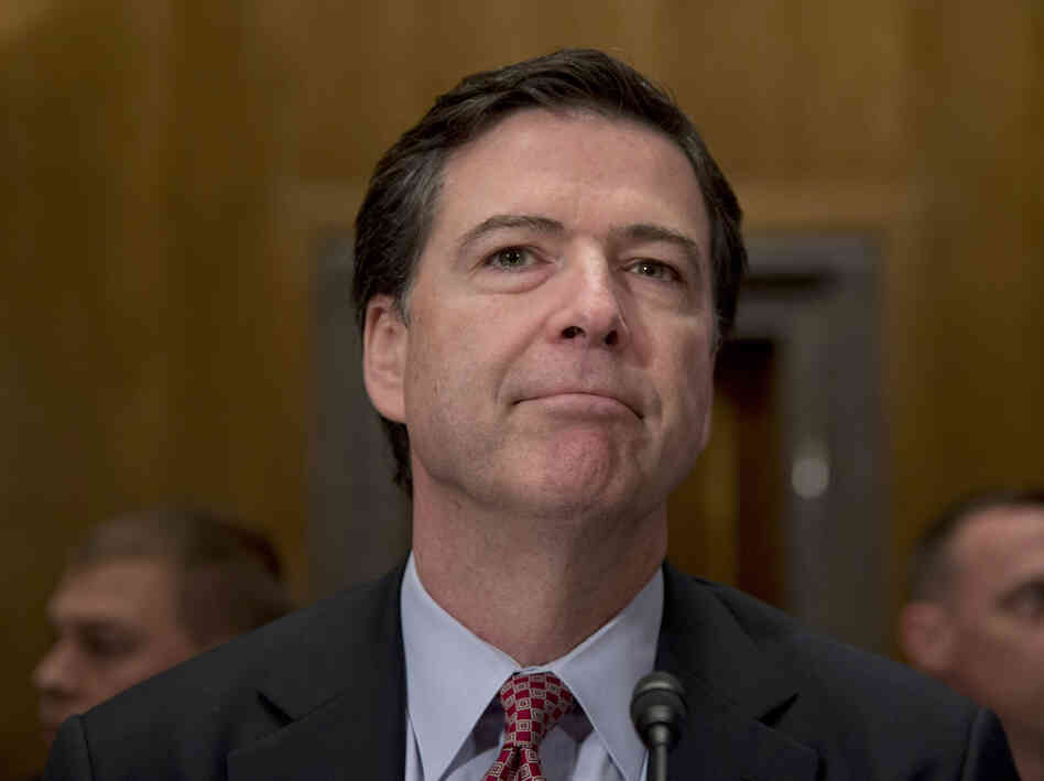 FBI Director James Comey testifies on Capitol Hill in Washington on Nov. 14, 2013. Speaking to reporters Thursday, Comey said he's "confused" by reports that characterize NSA contractor Edward Snowden as a "whistleblower" or a "hero." FBI Director James Comey testifies on Capitol Hill in Washington on Nov. 14, 2013. Speaking to reporters Thursday, Comey said he's "confused" by reports that characterize NSA contractor Edward Snowden as a "whistleblower" or a "hero."