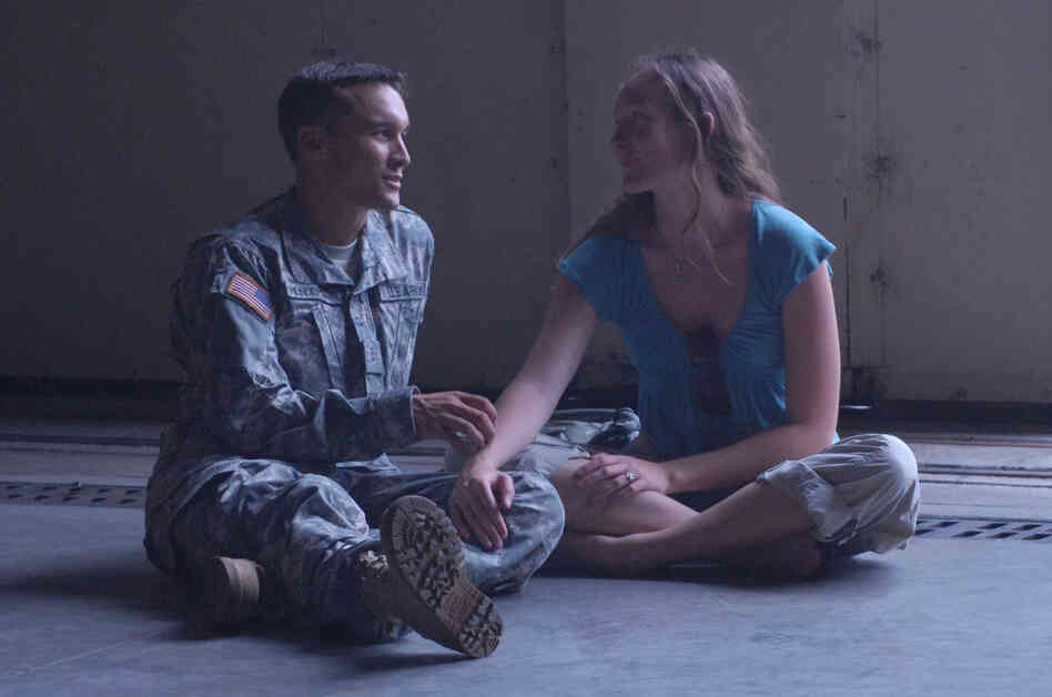 This photograph of Artis Henderson and her husband Miles was taken in 2006, on the day he deployed to Iraq. Miles was killed just a few months later in an Apache helicopter crash. This photograph of Artis Henderson and her husband Miles was taken in 2006, on the day he deployed to Iraq. Miles was killed just a few months later in an Apache helicopter crash.