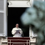 Pope Francis reads the list of 19 new Cardinals during the Angelus prayer in St. Peter's Square, at the Vatican on Sunday.