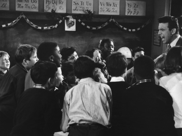 A teacher addresses a mixed-race class in Little Rock, Ark., in September 1957, where desegregation is being enforced by troops. (Image credit: Getty Images)