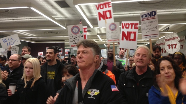 Boeing machinists and other supporters held a rally against the company's offer the day before the critical vote, which took place in early January. (Image credit: KPLU)