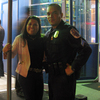 Prince George's County, Md., Police Officer Juan Damian and Dora Escobar outside one of her popular check cashing businesses. Prince George's County, Md., Police Officer Juan Damian and Dora Escobar outside one of her popular check cashing businesses.