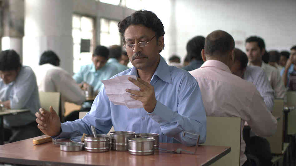 Through a delivery accident, Saajan Fernandes (Irrfhan Khan) begins a correspondence (and love affair) with a despondent housewife in The Lunchbox. Through a delivery accident, Saajan Fernandes (Irrfhan Khan) begins a correspondence (and love affair) with a despondent housewife in The Lunchbox.