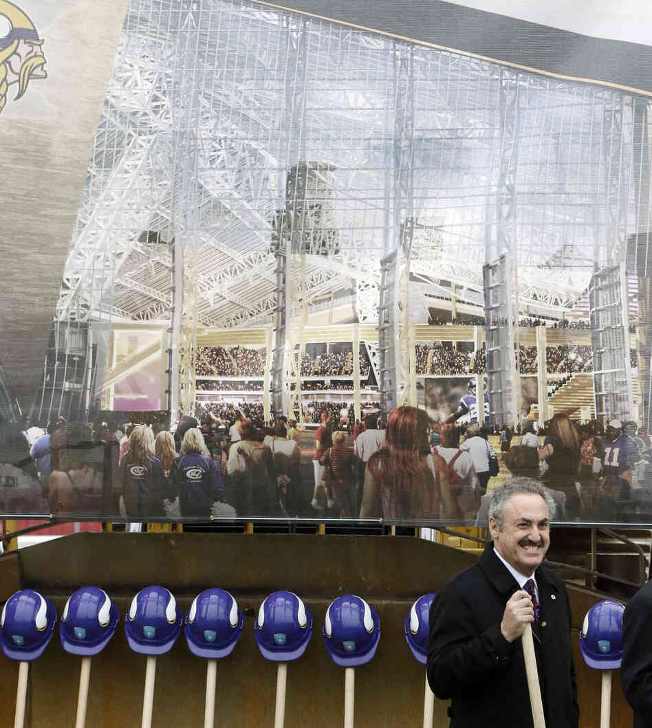 A rendering of the new Minnesota Vikings stadium hangs behind team owner Zygi Wilf at groundbreaking ceremonies for the new stadium on Dec. 3, 2013, in Minneapolis. A rendering of the new Minnesota Vikings stadium hangs behind team owner Zygi Wilf at groundbreaking ceremonies for the new stadium on Dec. 3, 2013, in Minneapolis.