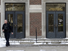 A police officer walks out of the Electrical Engineering Building on the campus of Purdue University in West Lafayette, Ind., Tuesday. One person was killed in a classroom by a gunman who surrendered to a police officer within minutes of the attack, officials said. A police officer walks out of the Electrical Engineering Building on the campus of Purdue University in West Lafayette, Ind., Tuesday. One person was killed in a classroom by a gunman who surrendered to a police officer within minutes of the attack, officials said.