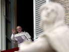 Pope Francis waves to faithful during the Angelus prayer from his studio overlooking St. Peter's Square at the Vatican on Sunday. President Obama will meet with the pope for the first time in March. Pope Francis waves to faithful during the Angelus prayer from his studio overlooking St. Peter's Square at the Vatican on Sunday. President Obama will meet with the pope for the first time in March.