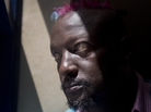 Kenyan writer Binyavanga Wainaina, one of Africa's leading literary figures, publicly declared his homosexuality in an online essay last weekend. In an interview with NPR's Tell Me More, he said the recent anti-gay legislation in Africa influenced his decision to come out. He's shown here after giving a television interview in Nairobi on Wednesday. Kenyan writer Binyavanga Wainaina, one of Africa's leading literary figures, publicly declared his homosexuality in an online essay last weekend. In an interview with NPR's Tell Me More, he said the recent anti-gay legislation in Africa influenced his decision to come out. He's shown here after giving a television interview in Nairobi on Wednesday.