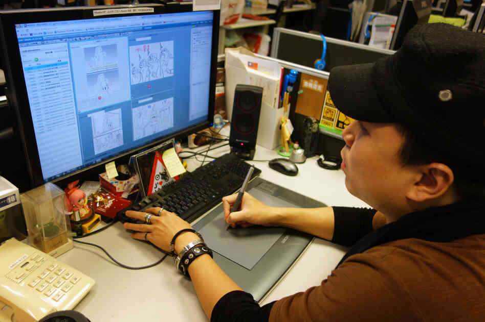 An animator at Next Media goes to work, drawing out the movements of characters in an upcoming story. An animator at Next Media goes to work, drawing out the movements of characters in an upcoming story.
