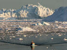 A boat skims through the melting ice in the Ilulissat fjord in August 2008, on the western coast of Greenland. A boat skims through the melting ice in the Ilulissat fjord in August 2008, on the western coast of Greenland.