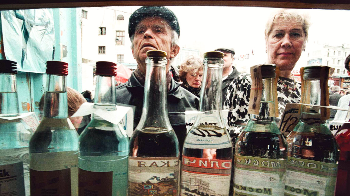 Shoppers check out vodka in a street kiosk in Moscow in 2008. Shoppers check out vodka in a street kiosk in Moscow in 2008.