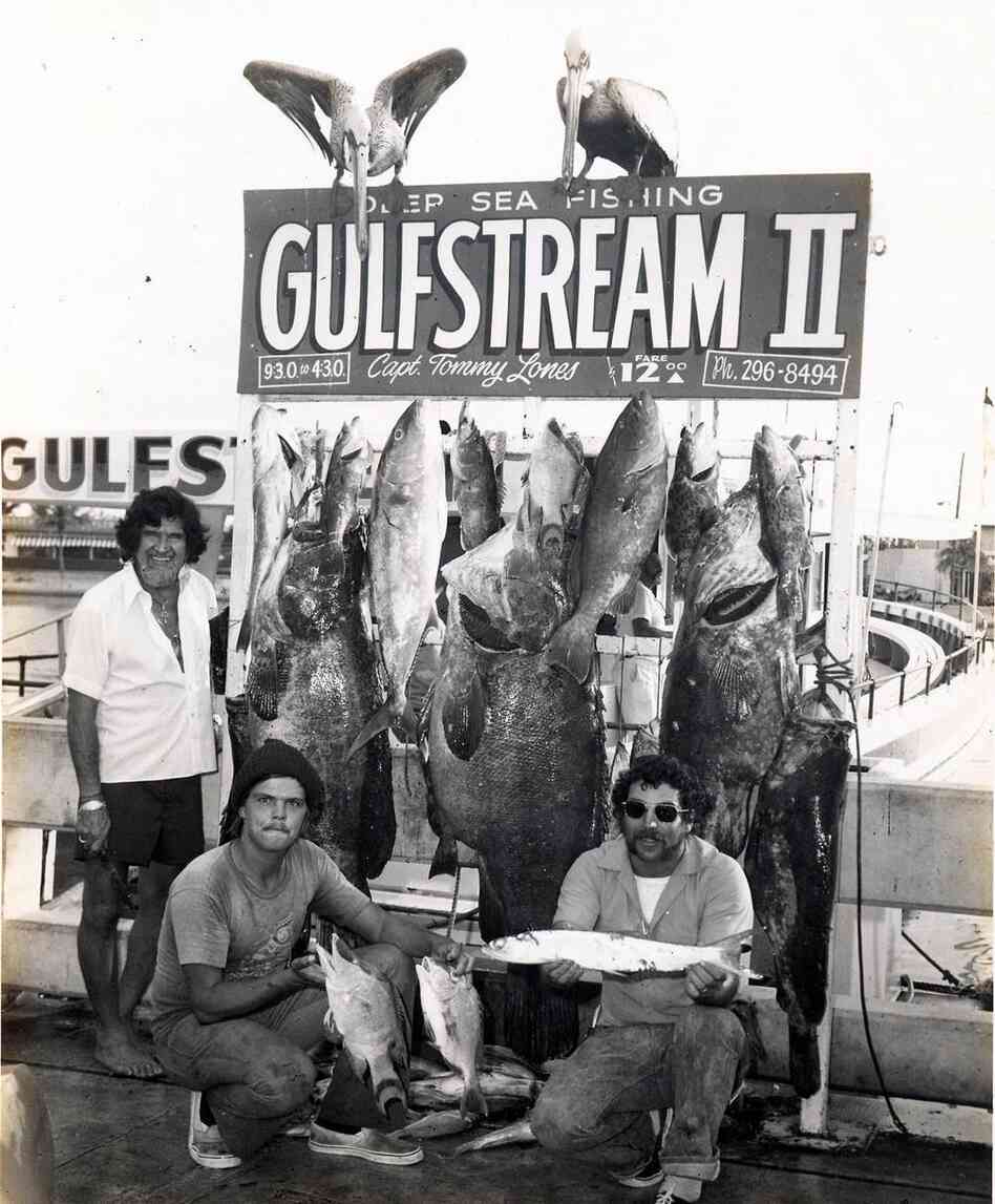 Even prize fish are smaller than the people who caught them in this photo from sometime between 1965 and 1979. Even prize fish are smaller than the people who caught them in this photo from sometime between 1965 and 1979.