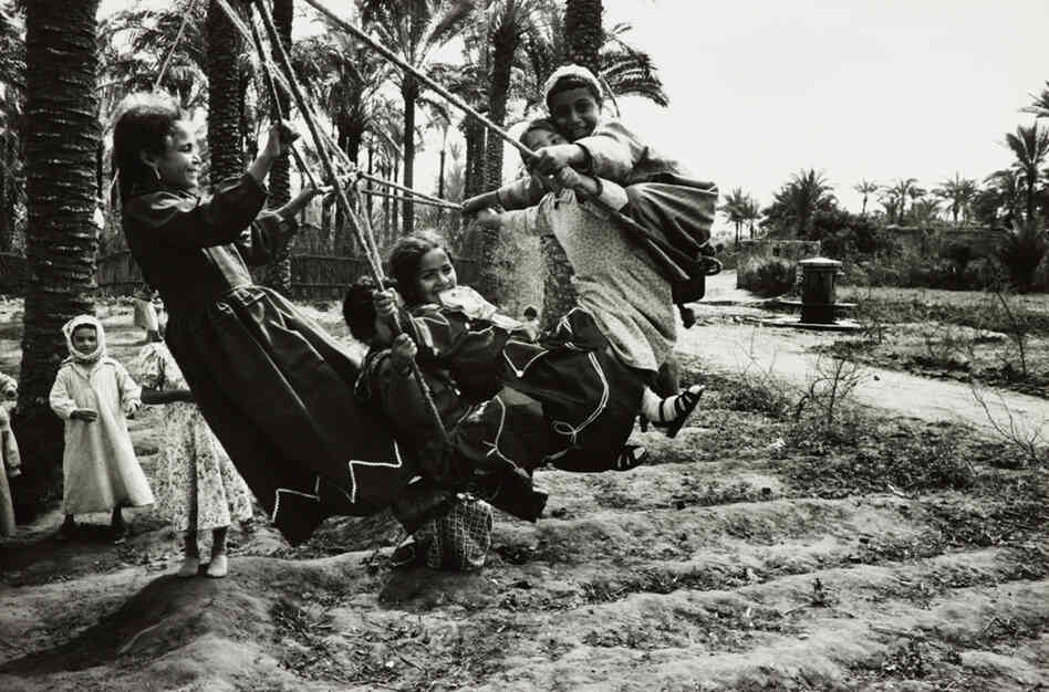 Schoolchildren on a homemade swing at Rosetta, Egypt, in 1947. Schoolchildren on a homemade swing at Rosetta, Egypt, in 1947.