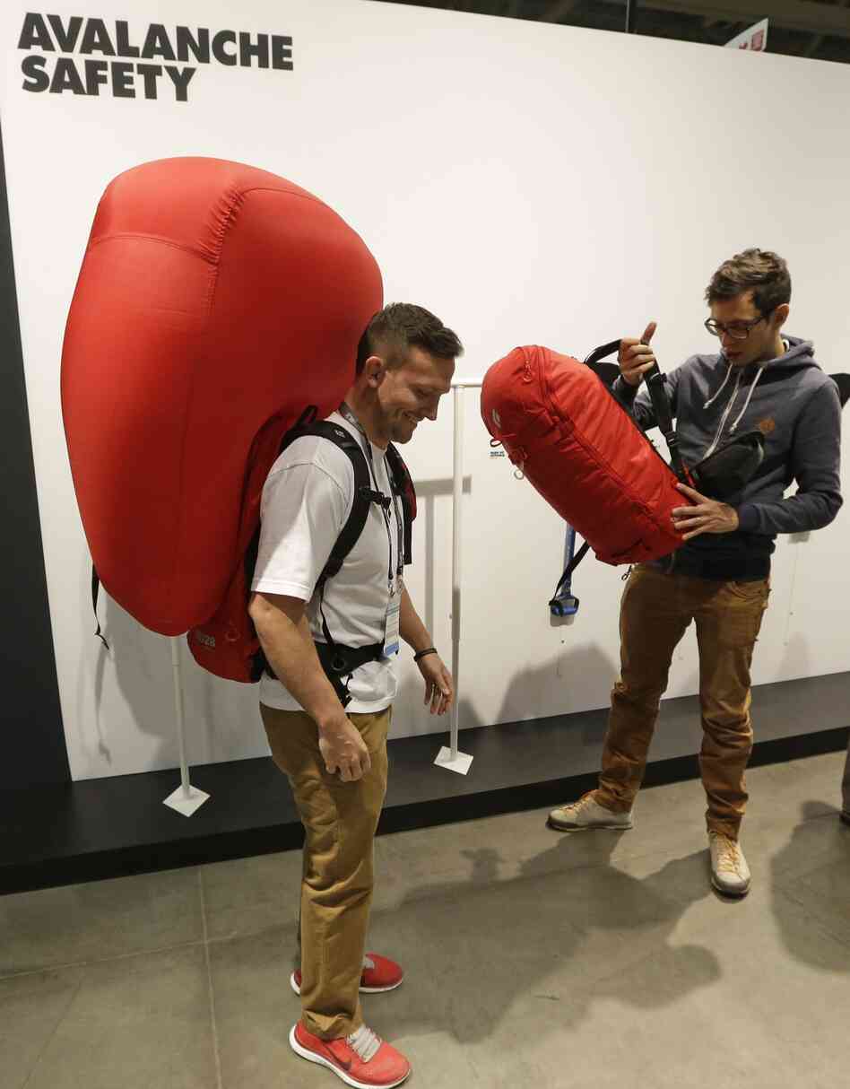 Derick Noffsinger models a deployed avalanche air bag pack made by Black Diamond at an industry market in Salt Lake City last month. Derick Noffsinger models a deployed avalanche air bag pack made by Black Diamond at an industry market in Salt Lake City last month.