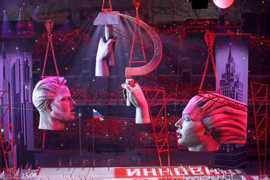 Scissor-lift platforms and banners create an urban landscape during the Opening Ceremony of the Sochi 2014 Olympic Games at the Fisht Olympic Stadium on Friday. Scissor-lift platforms and banners create an urban landscape during the Opening Ceremony of the Sochi 2014 Olympic Games at the Fisht Olympic Stadium on Friday.