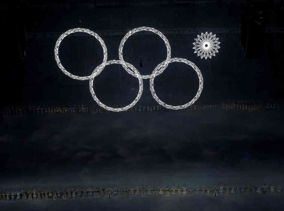A technical glitch kept one of the massive Olympic rings looming over the stadium dark during the opening ceremony of the 2014 Winter Olympics in Sochi, Russia, on Friday. A technical glitch kept one of the massive Olympic rings looming over the stadium dark during the opening ceremony of the 2014 Winter Olympics in Sochi, Russia, on Friday.