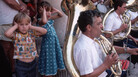 September 1984, Dubrovnik, Croatia --- Small children cover their ears as they stand next to a sousaphone player during a concert played by the Dubrovnik Saturday Band in Dubrovnik, Croatia, Socialist Federal Republic of Yugoslavia. September 1984, Dubrovnik, Croatia --- Small children cover their ears as they stand next to a sousaphone player during a concert played by the Dubrovnik Saturday Band in Dubrovnik, Croatia, Socialist Federal Republic of Yugoslavia.