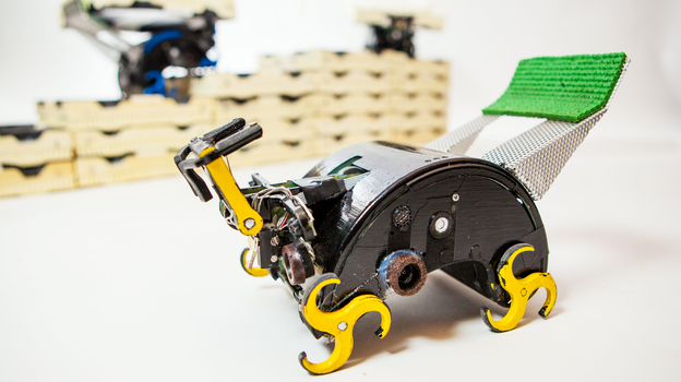 Climbing robots, modeled after termites, can be programmed to work together to build tailor-made structures. (Image credit: [Image courtesy of Eliza Grinnell, Harvard School of Engineering and Applied Sciences)