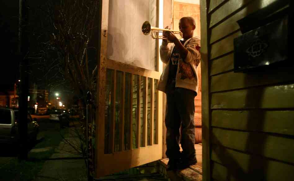 Eleven-year-old Jaron "Bear" Williams practices trumpet before marching in his first Mardi Gras season. The Whole Gritty City follows young student marching bands as they prepare for coveted spots in the New Orleans parade. Eleven-year-old Jaron "Bear" Williams practices trumpet before marching in his first Mardi Gras season. The Whole Gritty City follows young student marching bands as they prepare for coveted spots in the New Orleans parade.