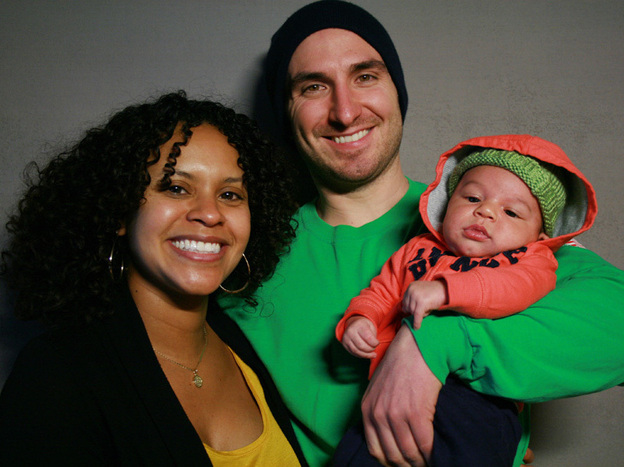 Sophy Medina and Thomas Olsen with their son, Luca. The couple spent their first Valentine's Day together fighting the same fire — before ending up in the hospital. (Image credit: StoryCorps)