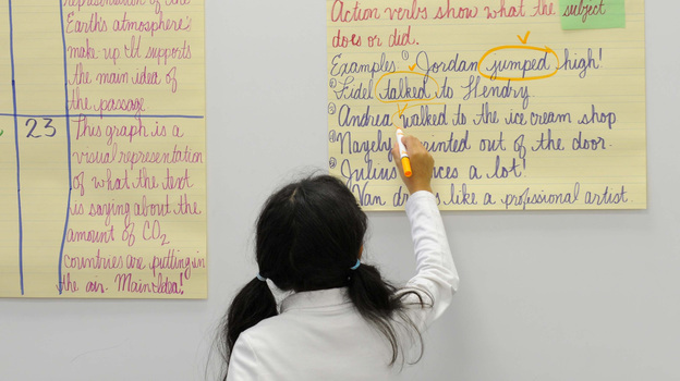 A fifth-grade student uses her cursive skills at a school in Baltimore. The Indiana Senate recently passed a bill that would restore instruction of cursive writing as an educational standard. (Image credit: MCT/Landov)