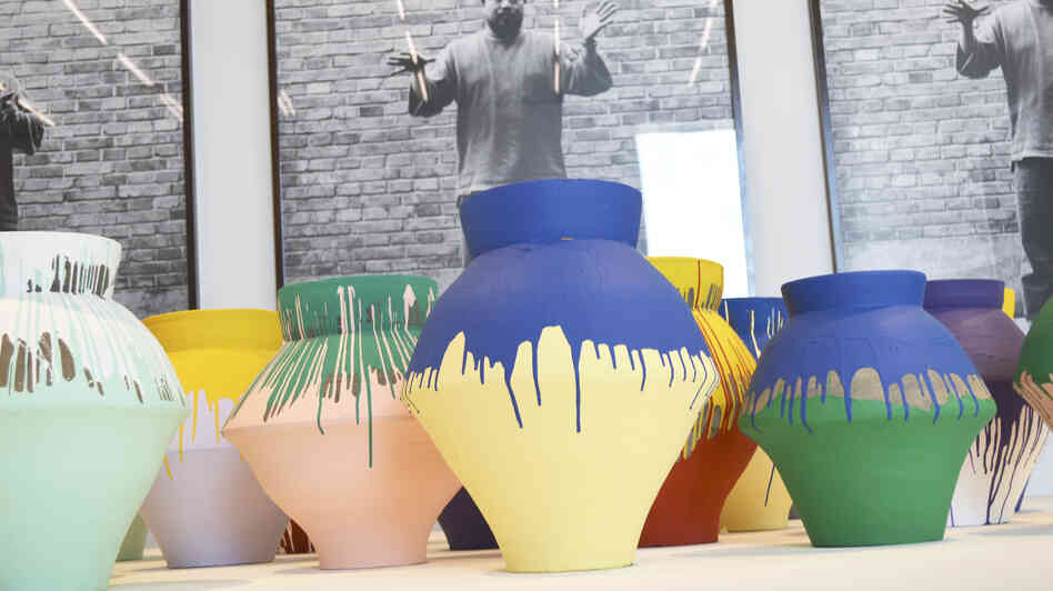 Chinese artist Ai Weiwei's "Colored Vases" is shown on display in December at the Perez Art Museum Miami. One of the vases in the exhibit was smashed Sunday. Chinese artist Ai Weiwei's "Colored Vases" is shown on display in December at the Perez Art Museum Miami. One of the vases in the exhibit was smashed Sunday.