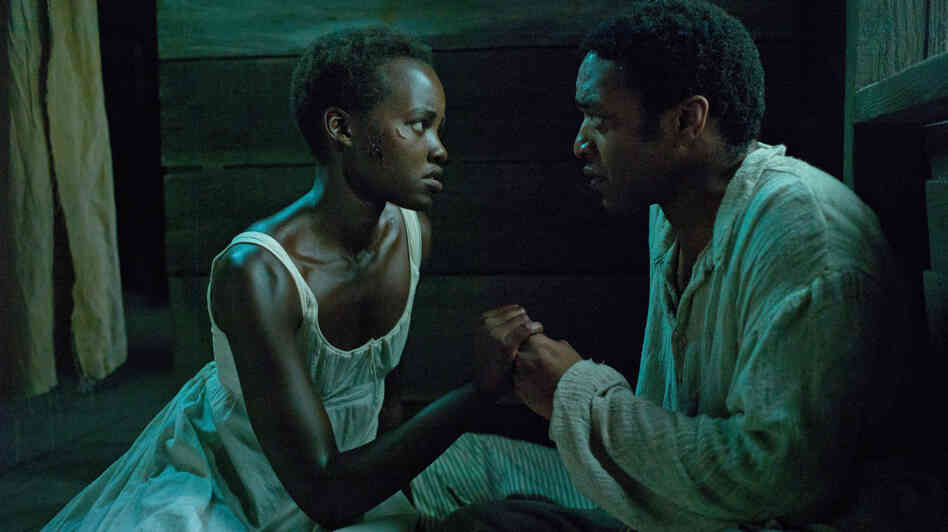 Lupita Nyong'o and Chiwetel Ejiofor in the Oscar-nominated 12 Years a Slave. Director Steve McQueen and film editor Joe Walker took a restrained, formal approach to portraying the "casual nightmare" of American slavery. Lupita Nyong'o and Chiwetel Ejiofor in the Oscar-nominated 12 Years a Slave. Director Steve McQueen and film editor Joe Walker took a restrained, formal approach to portraying the "casual nightmare" of American slavery.