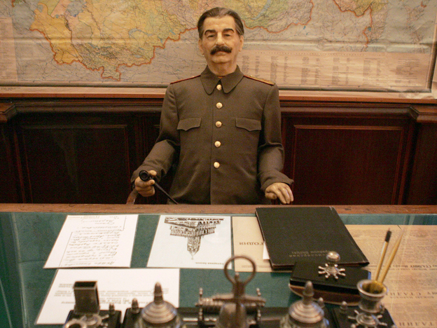 A wax sculpture of Stalin sits behind the desk he used at the dacha. From the time he first began to visit the villa, Stalin was signing death warrants for his rivals — and living in fear of retribution. (Image credit: AFP/Getty Images)