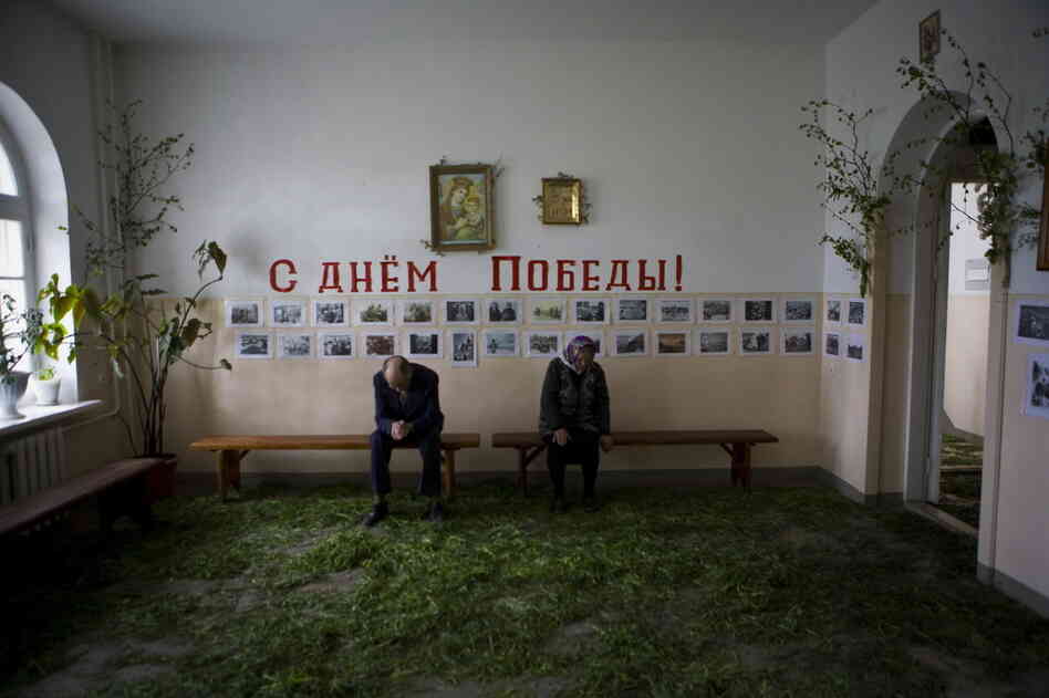 On Trinity Day in the village of Biysk in Altai, grass and birch branches are brought inside to decorate an Orthodox Church. On Trinity Day in the village of Biysk in Altai, grass and birch branches are brought inside to decorate an Orthodox Church.