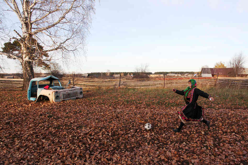 An eighth-grade student plays in a pick-up soccer match with her girlfriends in the Mari El Republic between the Russian cities of Kazan and Nizhny Novgorod. An eighth-grade student plays in a pick-up soccer match with her girlfriends in the Mari El Republic between the Russian cities of Kazan and Nizhny Novgorod.