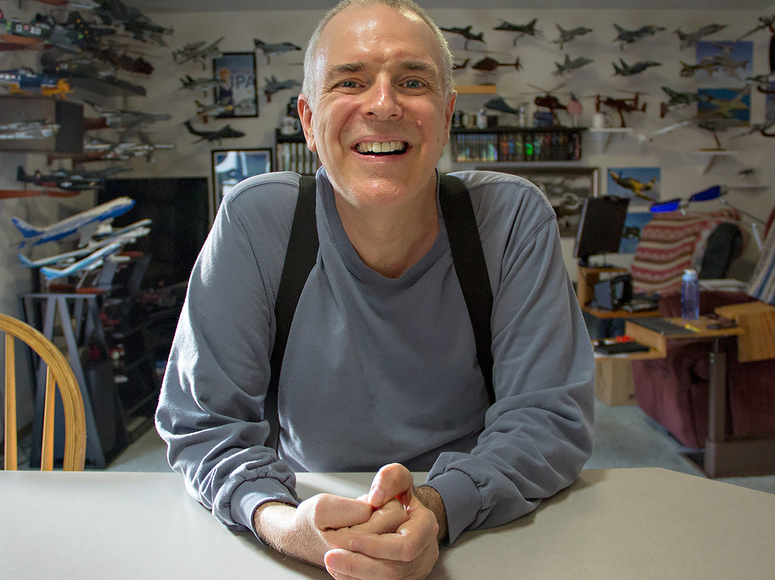 Carl Moore, a former helicopter mechanic, was diagnosed with ALS 20 years ago. He has had unusual longevity for someone with ALS but expects someday to rely on his wheelchair and speech-generating device. Carl Moore, a former helicopter mechanic, was diagnosed with ALS 20 years ago. He has had unusual longevity for someone with ALS but expects someday to rely on his wheelchair and speech-generating device.