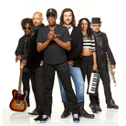 Arsenio Hall with his band. Robin DiMaggio stands to the right of Arsenio. Arsenio Hall with his band. Robin DiMaggio stands to the right of Arsenio.